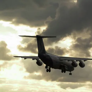 BAe 146 Brussels landing in sunset