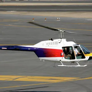 Bell 206 Jetranger taking-off for photo shoot at Dubai Airshow 2005