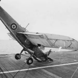 Fairey Barracuda II, hitting the barrier and falling onto its nose on HMS Ravager Fairey Barracuda II, hitting the barrier and falling onto its nose on HMS Ravager