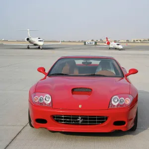 Ferrari car with executive jets at Dubai Airshow 2005