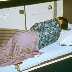 Malaysian Airlines cabin crew taking a rest in sleeping quarters