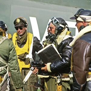 Pilots dressed in vintage flying gear at Oshkosh