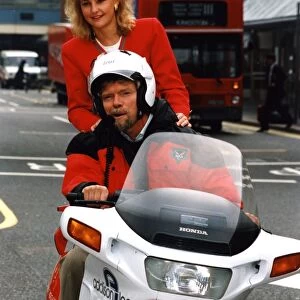 Richard Branson tries out his new motor cycle chauffeur service