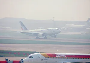 Aircraft landing at Heathrow Airport, London Uk on a misty morning