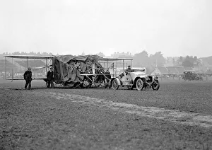 Alex Ogilvies Wriglane half draped in a tarpauline being towed
