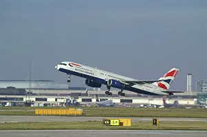 B. A;757-236;taking off;runnway furiture;airport buildings in background