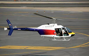 Bell 206 Jetranger taking-off for photo shoot at Dubai Airshow 2005