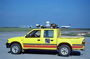 Bird Scaring vehicle on runway at East Midlands Airport UK