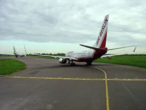 Boeing 737-800 Air Berlin taxiing in queue at Stansted Airport