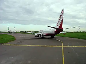 Boeing 737-800 Air Berlin taxiing in queue at Stansted Airport