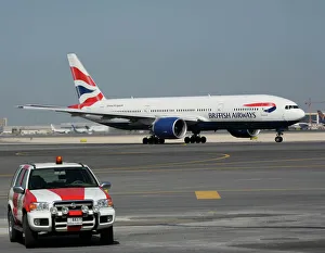 Boeing 777-200 British Airways at Dubai airport with ramp vehicle Boeing 777-200 British Airways at Dubai airport with ramp vehicle