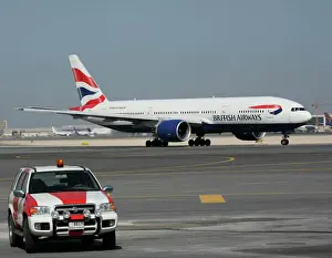 Boeing 777-200 British Airways at Dubai airport with ramp vehicle
