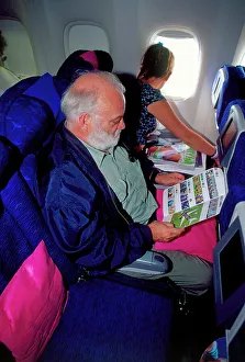 Flight Gallery: British Airways Boeing 777 reading safety card (c) Hobbs