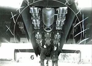 Flight Collection: Crew of an RAF Halifax bomber load bombs, during World war Two