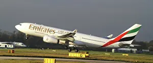 Emirates;A330;rotate;arabic logo;wheels still down;take off