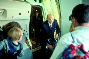 familiy boarding BA 747 at Logan Boston Hoare