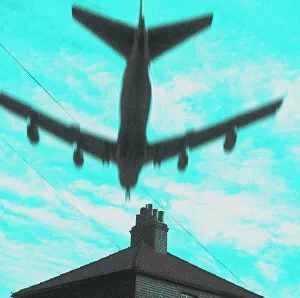 Flying low over house