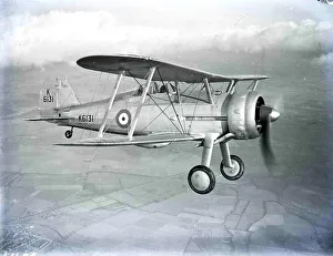 he Gloster Gladiator (or Gloster SS.37) was a British-built biplane fighter he Gloster Gladiator (or Gloster SS.37) was a British-built biplane fighter