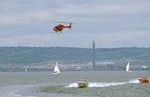 Images Dated 13th February 2006: Helicopter being used to film power boat race