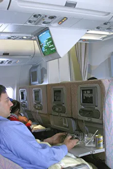 Images Dated 6th February 2003: Interior: pax watching screen