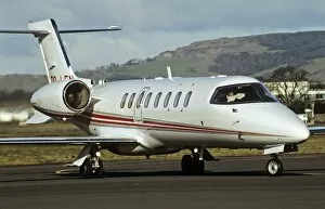 Images Dated 13th February 2006: Learjet 45 with pilot reading map in cockpit