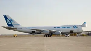 Modern Aircraft Prints: Ocean Airlines 747 Cargo at Brescia Italy with nose Cargo open