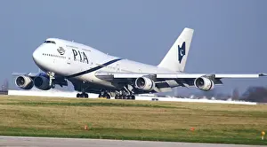 PIA;747-200;landing;nosewheel coming down;white aircraft sunny day;manchester