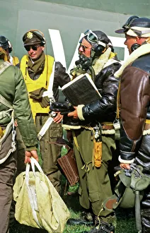 Pilots dressed in vintage flying gear at Oshkosh