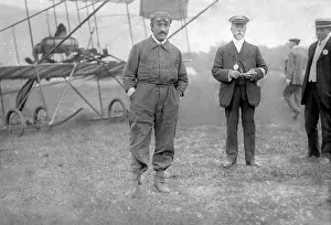 <b class=qtipBold><figcaption>Posing for the camera</figcaption></b><br>Posing for the camera at the 1910 Bournemouth meeting pioneer Belgian aviator, Joseph Christiaens (with goggles) and his Henry Farman biplane. The original caption states that the meeting official with the beard is a Fred May.<br><em>© Flight Global 2009 - All Rights Reserved</em> Posing for the camera