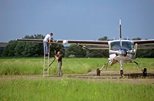 Flight Collection: randall cessna 208b grand caravan being refuelled