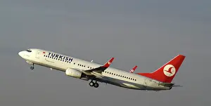 turkish;737-800;Airborne;climbing;blue grey sky;wheels still down